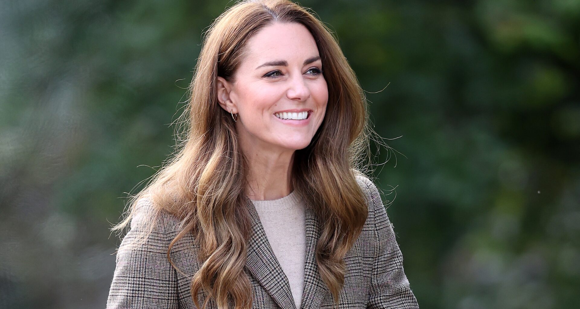 Catherine, Princess of Wales smiles as she arrives to embark on a boat trip on Lake Windermere in 2021