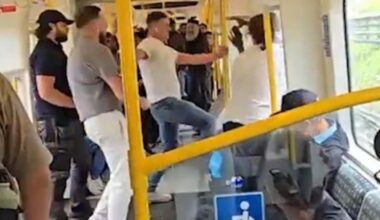 Vigilante commuter who stepped in when passenger dropped his trousers in front of children on packed London Tube is now questioned by police