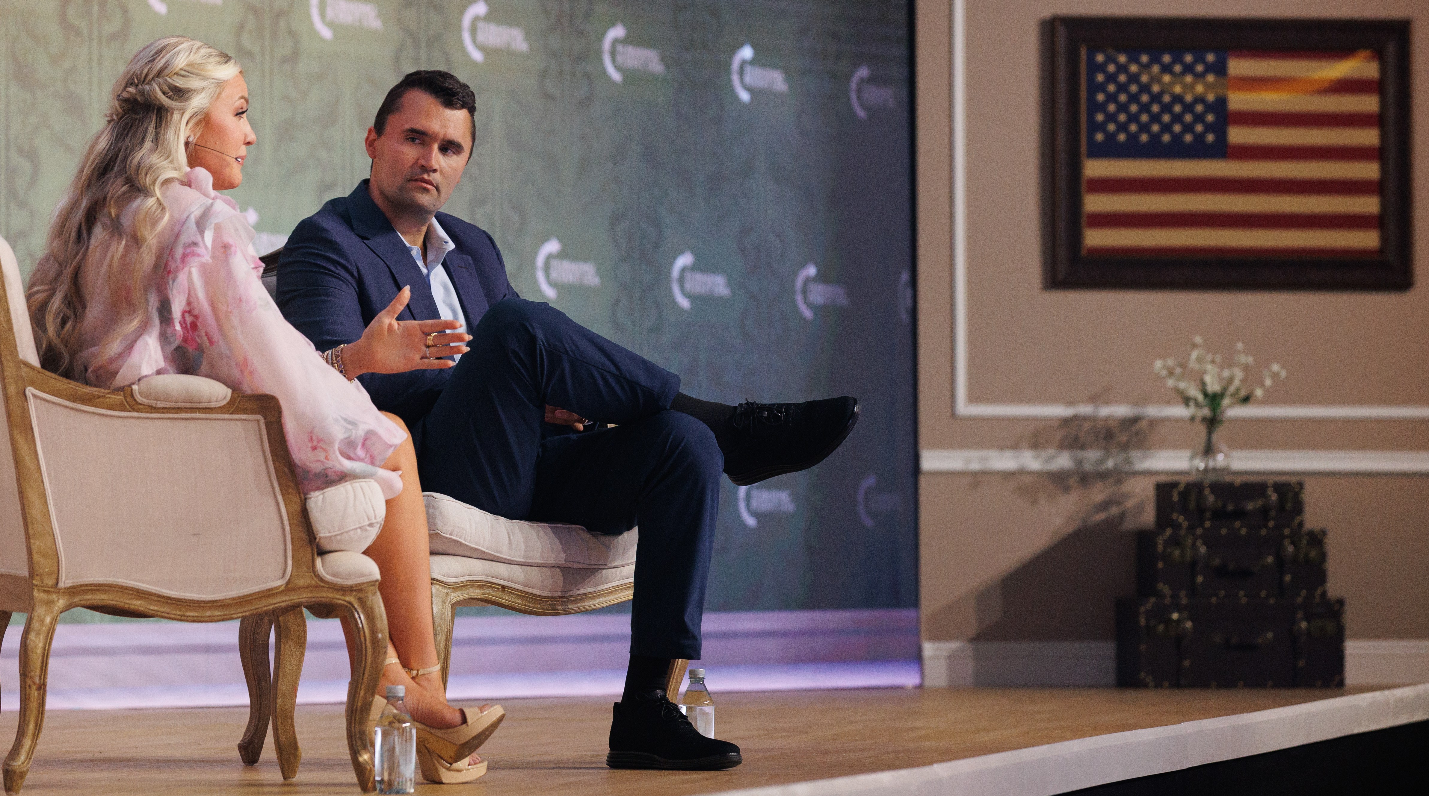 Erika and Charlie Kirk speaking at the Young Women’s Leadership Summit.