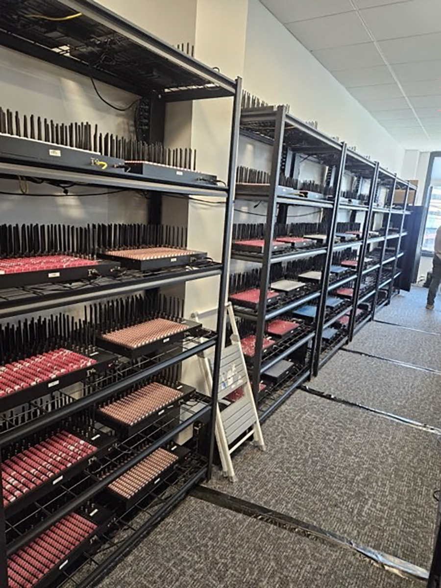 Racks of dismantled communications devices that were seized
