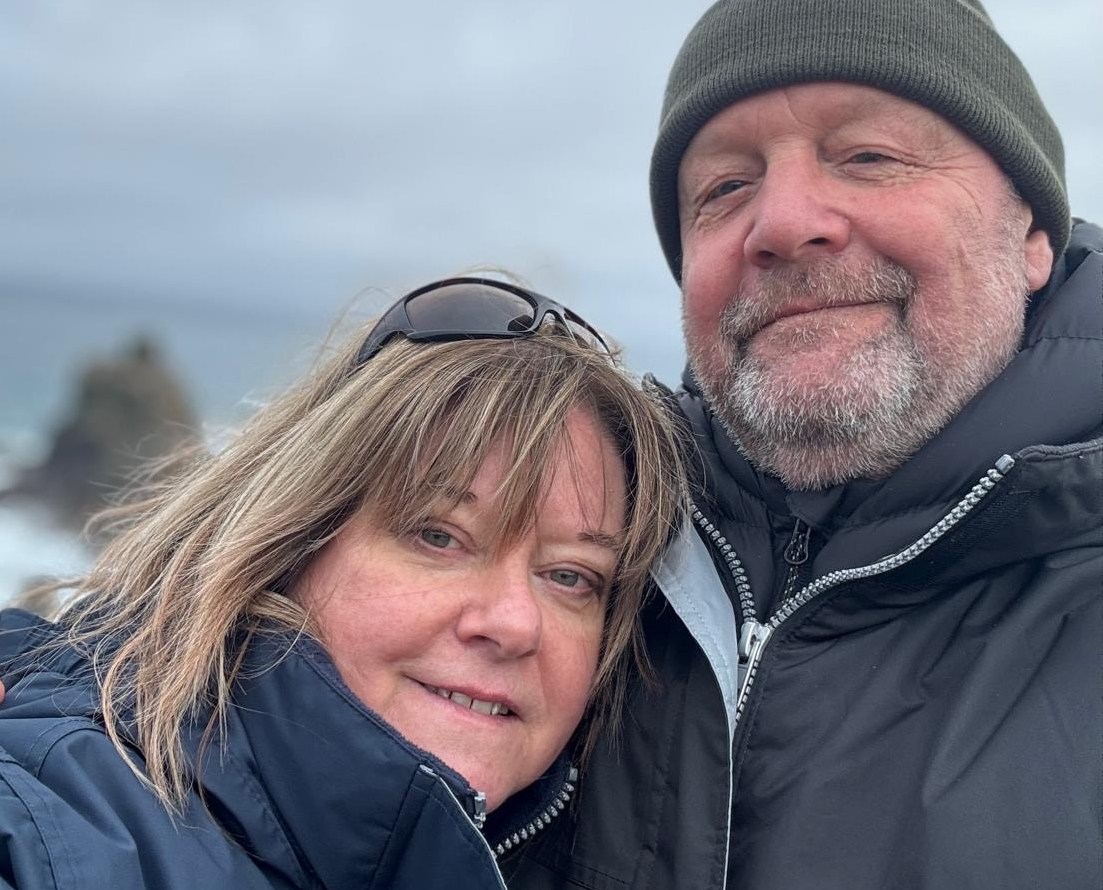 Karen and Glyn Woodland in winter coats.