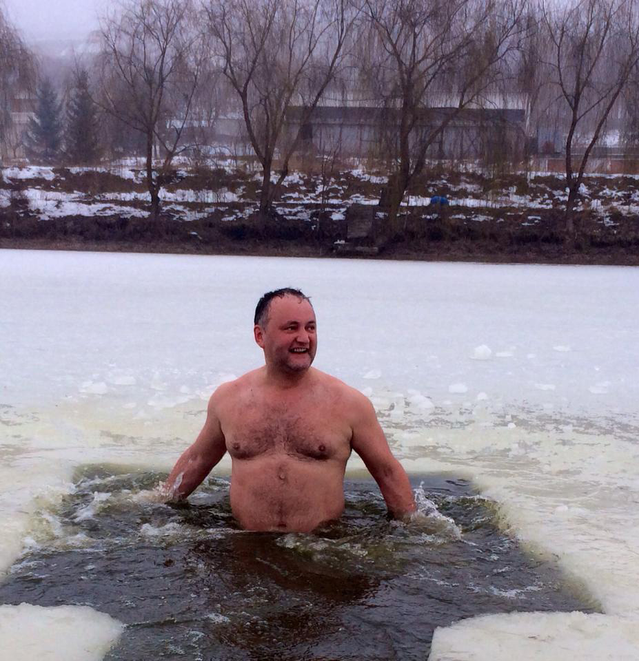 Igor Dodon ice bathing in a frozen lake.