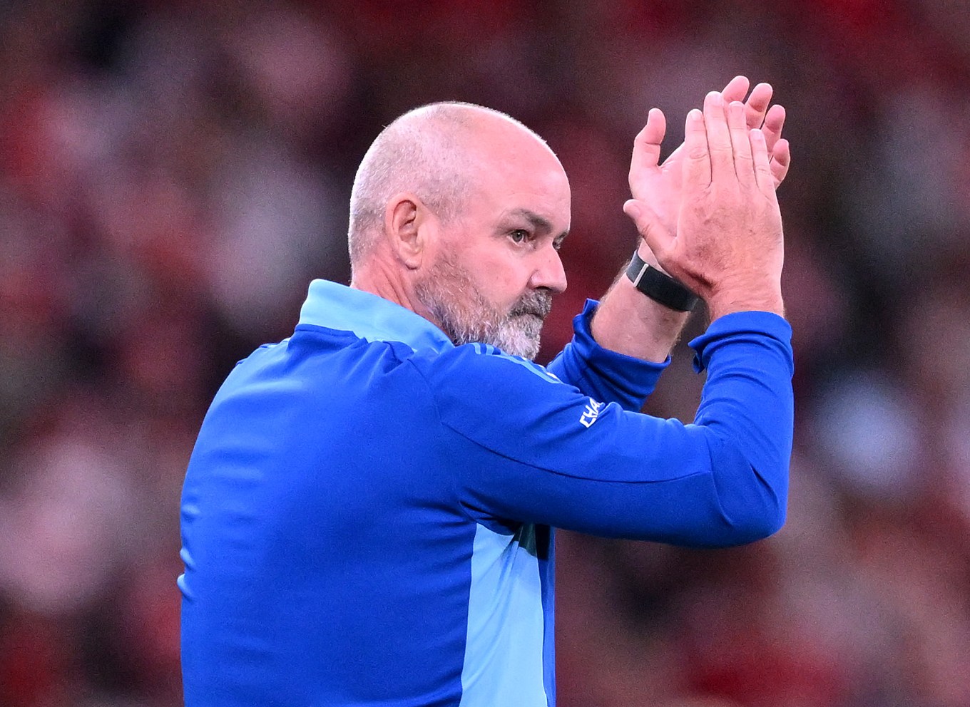Steve Clarke, Scotland's head coach, applauds at a World Cup qualifier.