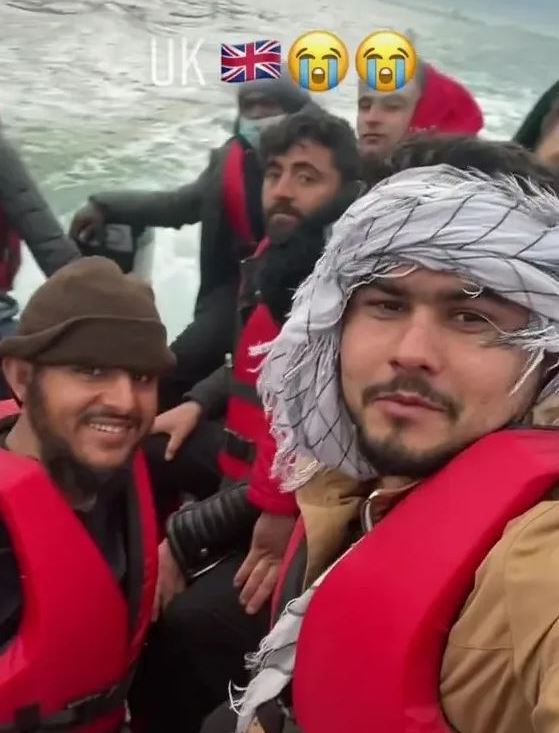 DG Usama and other Afghan migrants in a boat crossing the channel.