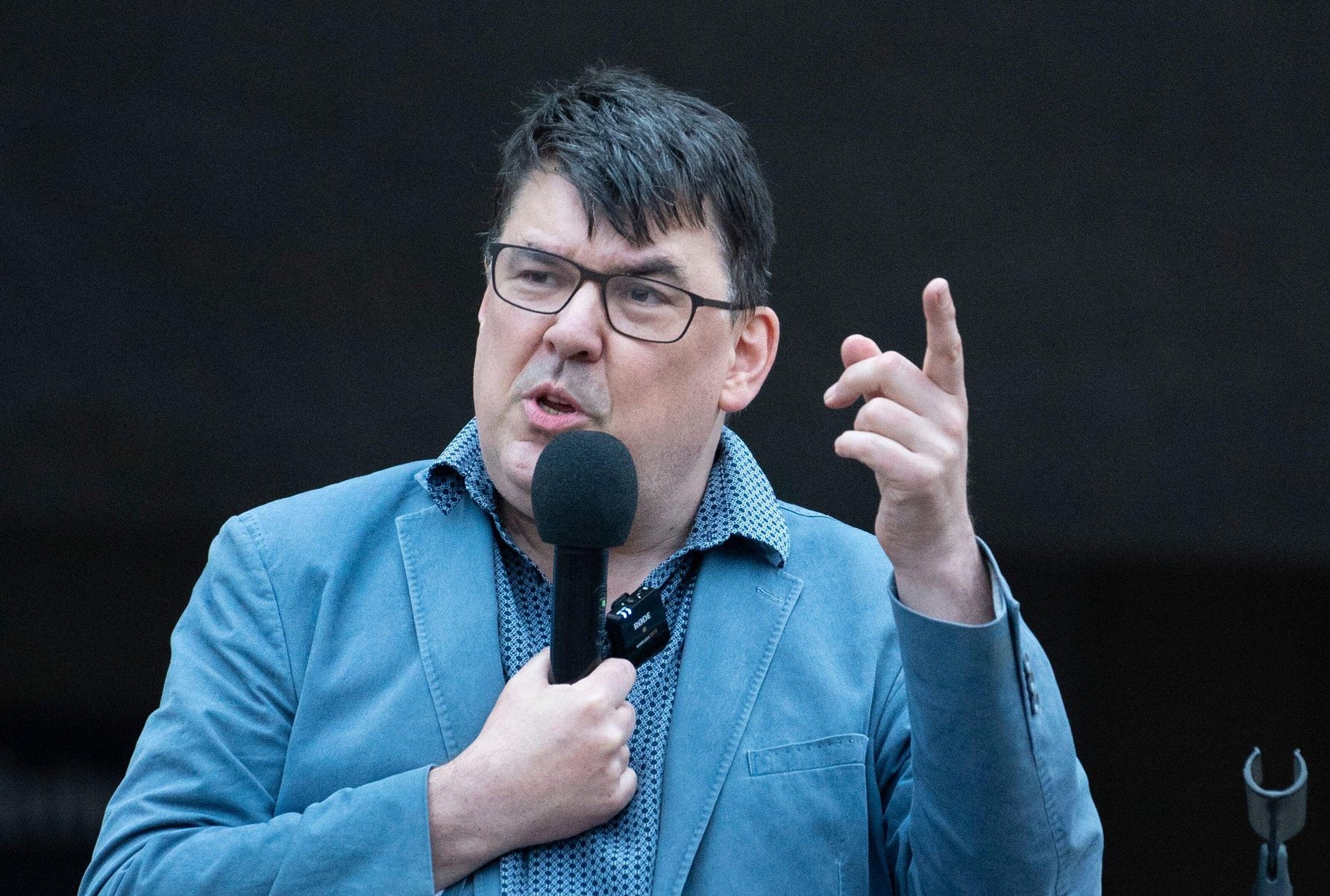 Graham Linehan performing stand-up comedy.