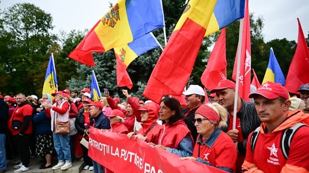 Supporters of The Patriotic Block (BEP) party take part in a rally in Chisinau on September 25, 2025, ahead of the parliamentary elections on September 28. The ex-Soviet republic, wedged between war-torn Ukraine and EU member Romania, has repeatedly warned of in Russian interference. Moldovan author