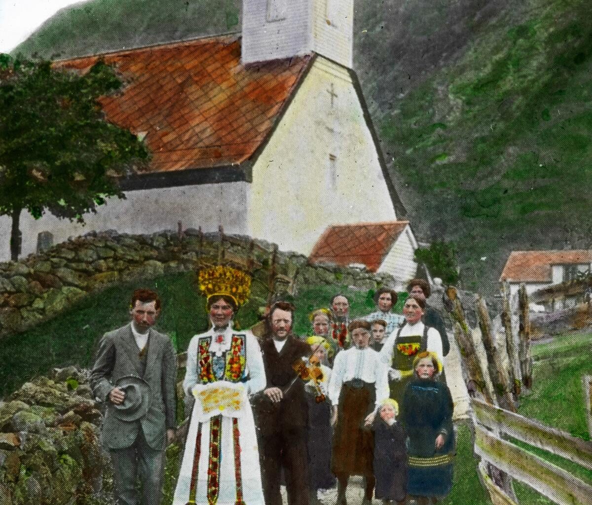 Wedding procession in Eidfjord church. Norway, 1900. Hand-colorized.