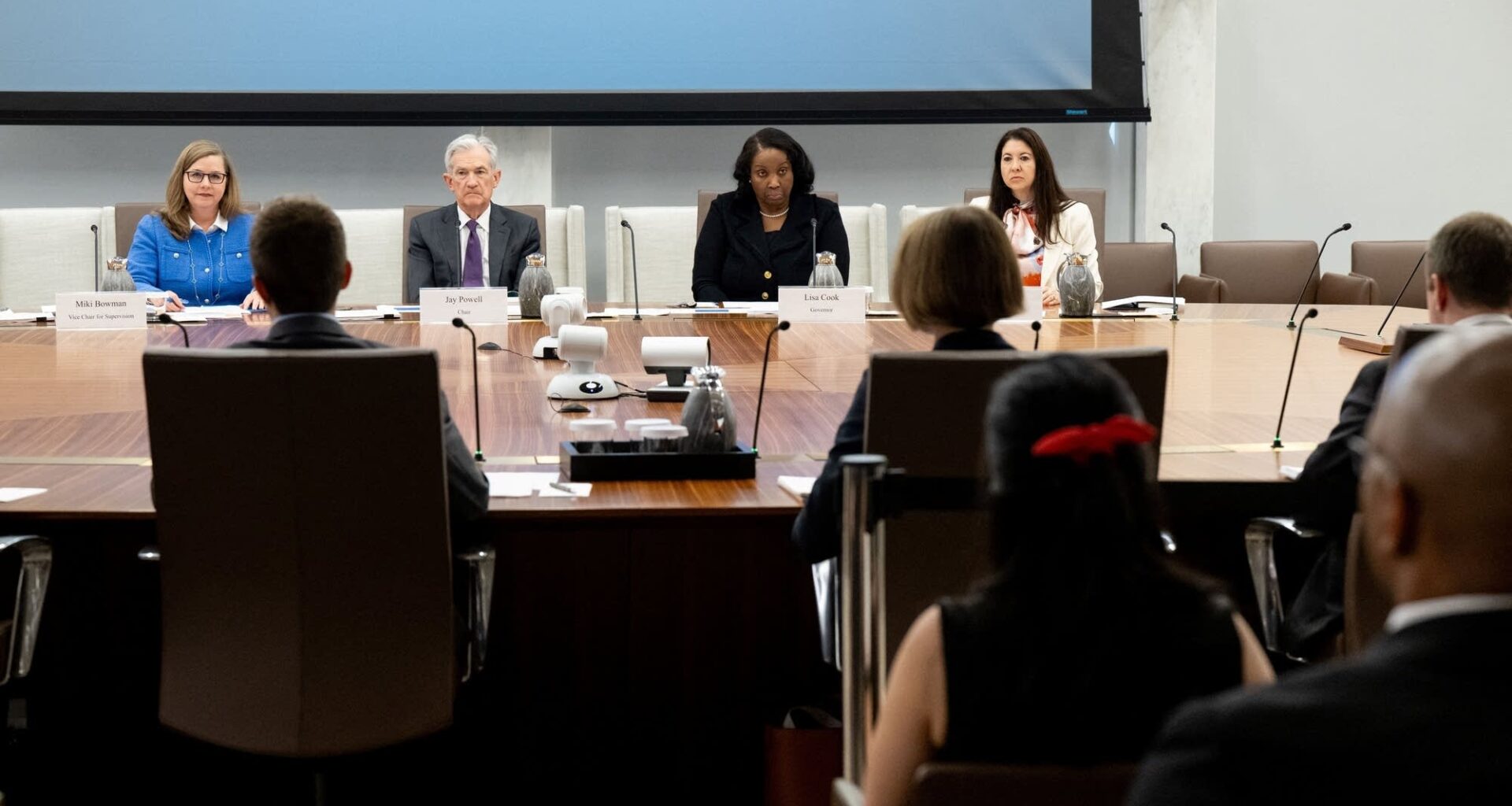 Fed Chair Jerome Powell speaks alongside Michelle Bowman (L), Board Vice Chair for Supervision, Lisa Cook (2nd R), Board Governor, and Adriana Kugler (R), Board Governor, at a Federal Reserve Board open meeting.