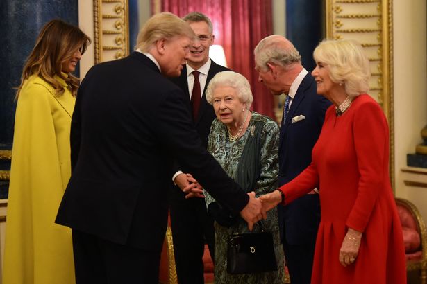 Britain's Queen Elizabeth II (C) speaks with US First Lady Melania Trump (L) and US President Donald Trump (2nd L), Britain's Camilla, Duchess of Cornwall (R) and Britain's Prince Charles, Prince of Wales (2nd R) in Buckingham Palace in central London on December 3, 2019