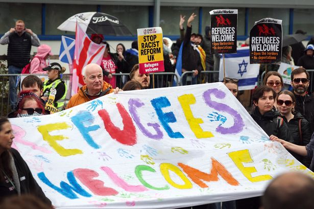 Anti-Racism protesters come out in support of refugees outside the Cladhan Hotel 