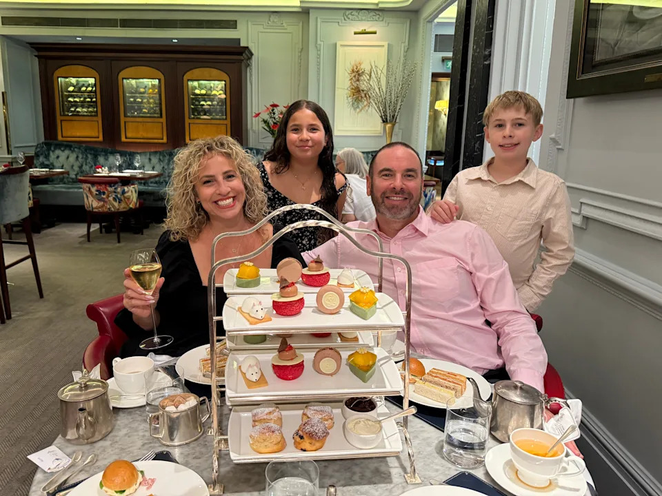 The family at tea in London.