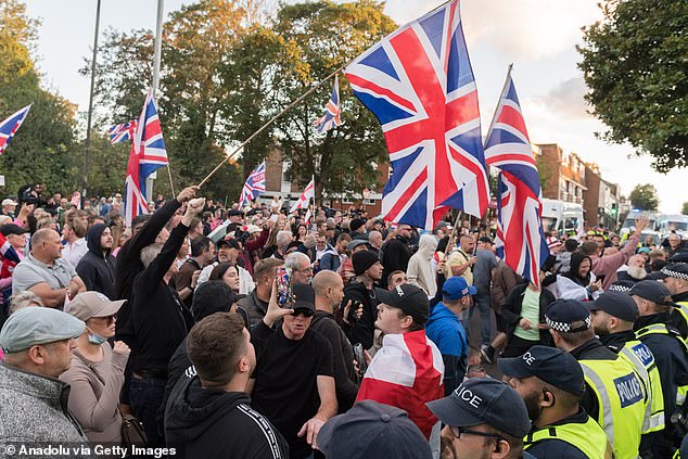 Demonstrators gather outside The Civic Offices in a protest against housing of asylum seekers at The Bell Hotel in Epping, United Kingdom on August 31, 2025