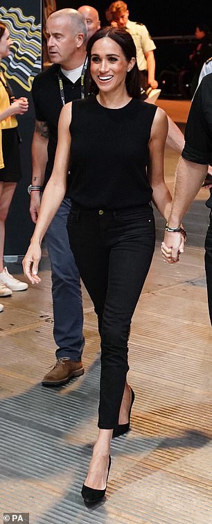 In another appearance, Meghan embodied understated chic in an all-black ensemble of a Crew tank top, Frame skinny jeans and Aquazzura court shoes