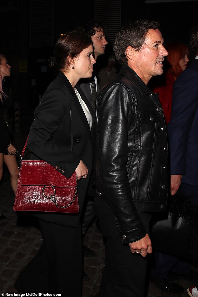In another image, she was pictured alongside sports and entertainment manager David Gardner (pictured)