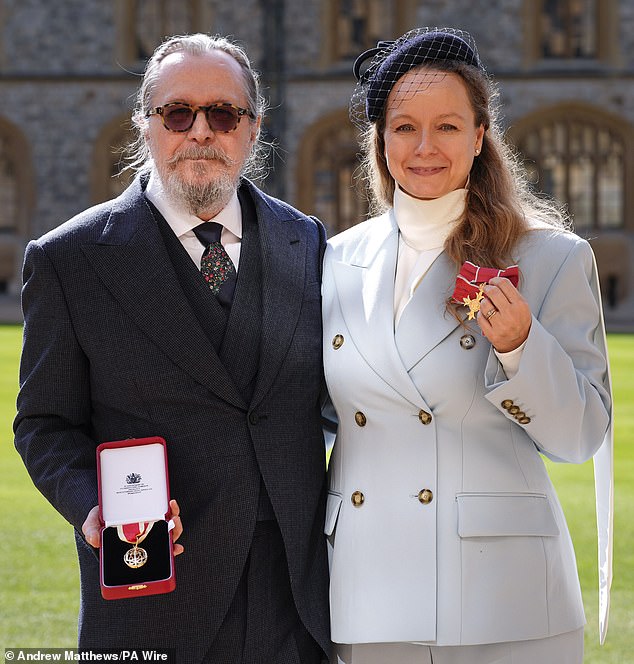 Gary and Samantha posed with his medal outside