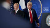 U.S. President Donald Trump and Russian President Vladimir Putin arrive for a press conference at Joint Base Elmendorf-Richardson on Aug. 15, 2025 in Anchorage, Alaska.