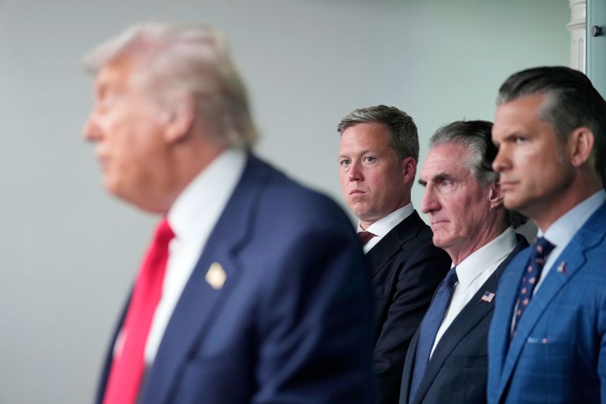 Army Secretary Dan Driscoll watches as President Donald Trump announces the federal takeover of police in Washington, DC, on August 11.