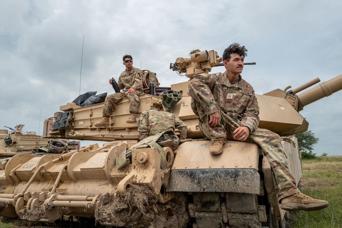 Army soldiers rest on a tank during combat training in Killeen, Texas, on June 3.