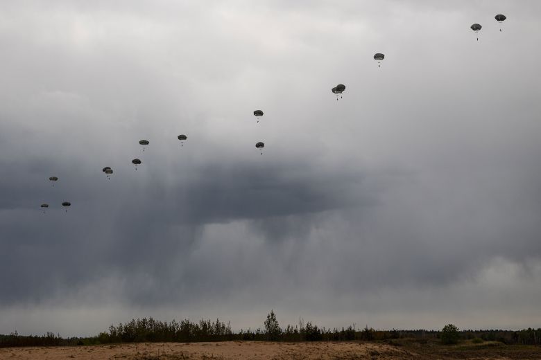 Soldiers parachute during an airborne operation by the US 173rd Airborne Brigade during Iron Wolf military exercises alongside NATO partners near Rukla, Lithuania, on May 16.