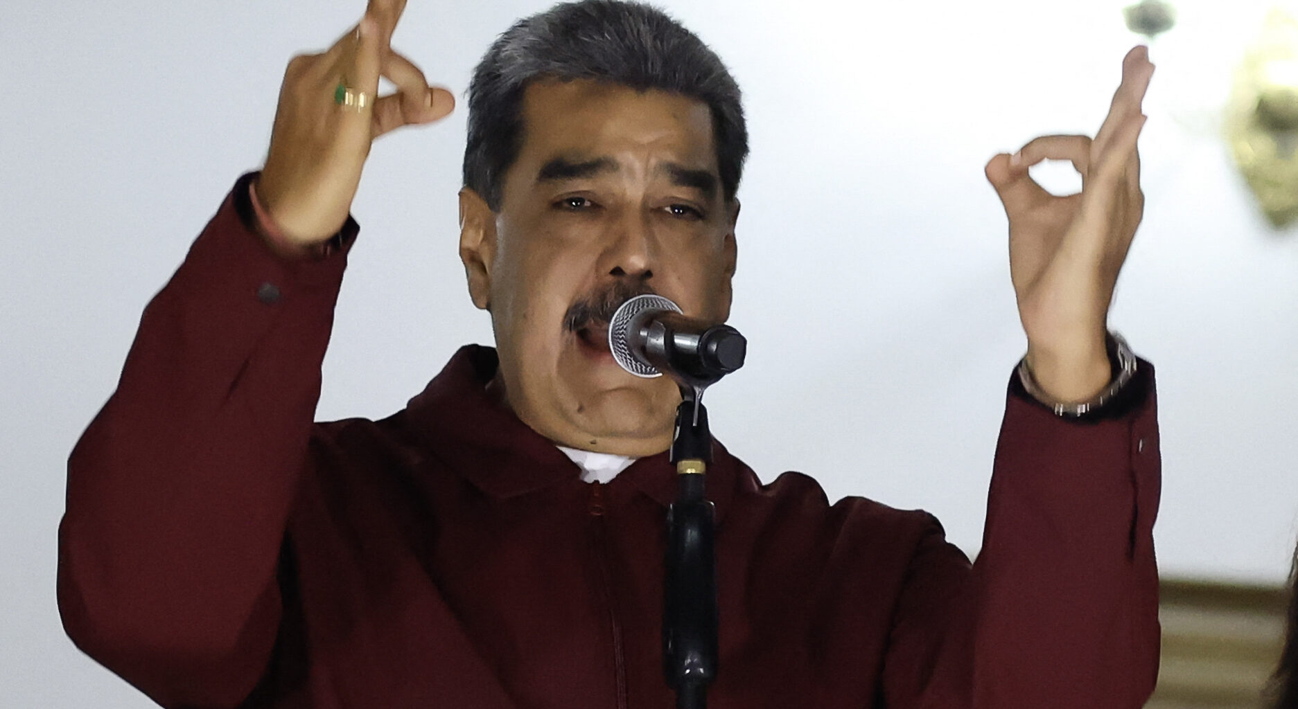 Nicolas Maduro gestures while speaking