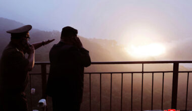 In this photo provided by the North Korean government, North Korean leader Kim Jong Un, right, watches a test of a new rocket engine at an undisclosed location, North Korea, Monday, Sept. 8, 2025. Independent journalists were not given access to cover the event depicted in this image distributed by the North Korean government. The content of this image is as provided and cannot be independently verified. (Korean Central News Agency/Korea News Service via AP)