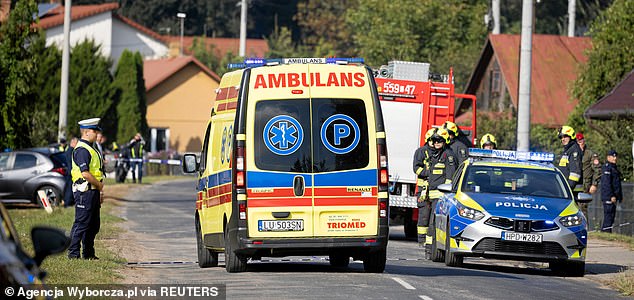 An ambulance drives past a police officer and firefighters after a drone or similar object struck a residential building according to local authorities, following violations of Polish airspace during a Russian attack on Ukraine, in Wyryki municipality, Poland September 10, 2025.  Agencja Wyborcza.pl/Jakub Orzechowski/via REUTERS   ATTENTION EDITORS - THIS IMAGE WAS PROVIDED BY A THIRD PARTY. POLAND OUT. NO COMMERCIAL OR EDITORIAL SALES IN POLAND.