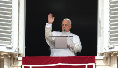 Pope Leo XIV appears Sunday at his studio's window to bless the faithful gathered in St. Peter's Square at the Vatican for the Angelus prayer.