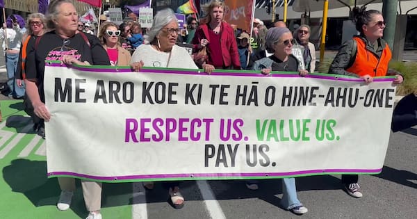 Protestors march against Government's pay equity changes