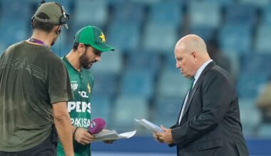 Pakistan's captain Salman Agha shares the team list with match referee Andy Pycroft at the toss during the Asia Cup cricket match against the UAE at Dubai International Cricket Stadium on September 17, 2025. Photo: PTI