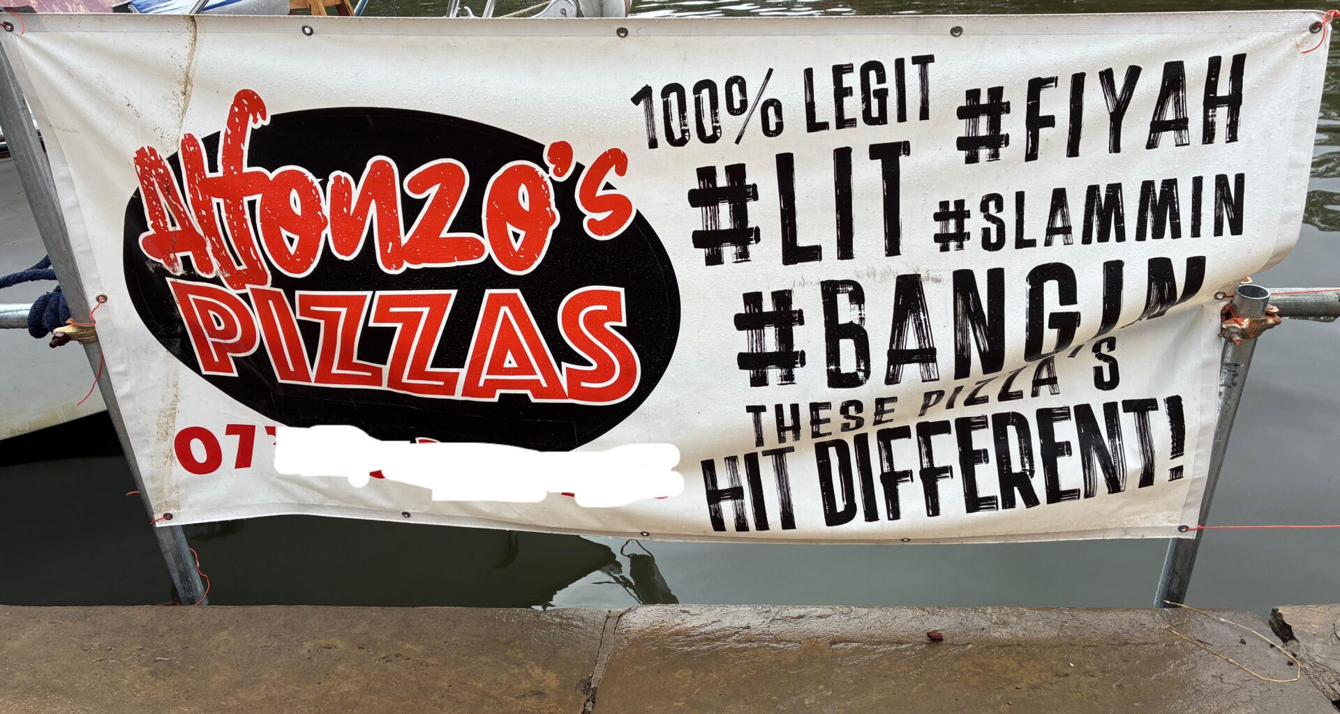 When I'm dithering about whether to dial the mobile number to order "pizza's" from a sign on a bedsheet, cable tied to a railing on a riverbank, I'm always reassured to see they're "100% LEGIT"