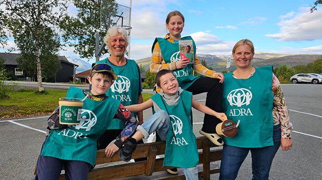 The world’s northernmost Adventist school, located above the Arctic Circle, features Inspector Petter Moltzau and Headteacher Adelinn Fønnebø with pupils at Ekrehagen School in Tromsø.