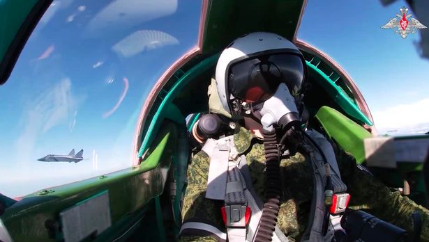 Russian MiG-31BM fighters provide cover for long-range aviation crews during the joint Russian-Belarusian military drills