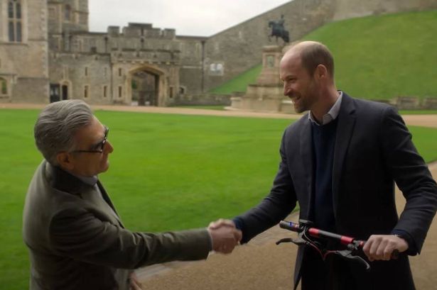 Prince William shaking hands with Eugene Levy