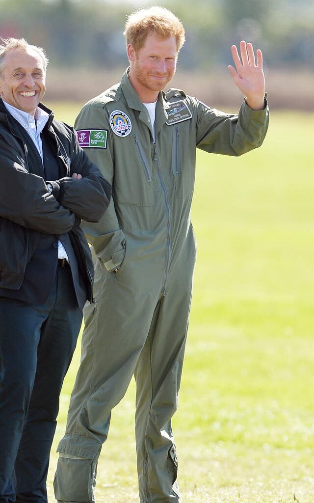 Prince Harry waves during Battle of Britain commemorations in 2015