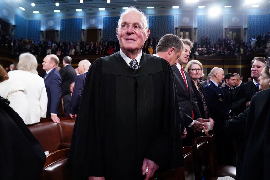 Retired Supreme Court Justice Anthony Kennedy stands in the House of Representatives on March 7, 2024, ahead of President Joe Biden's third State of the Union address.