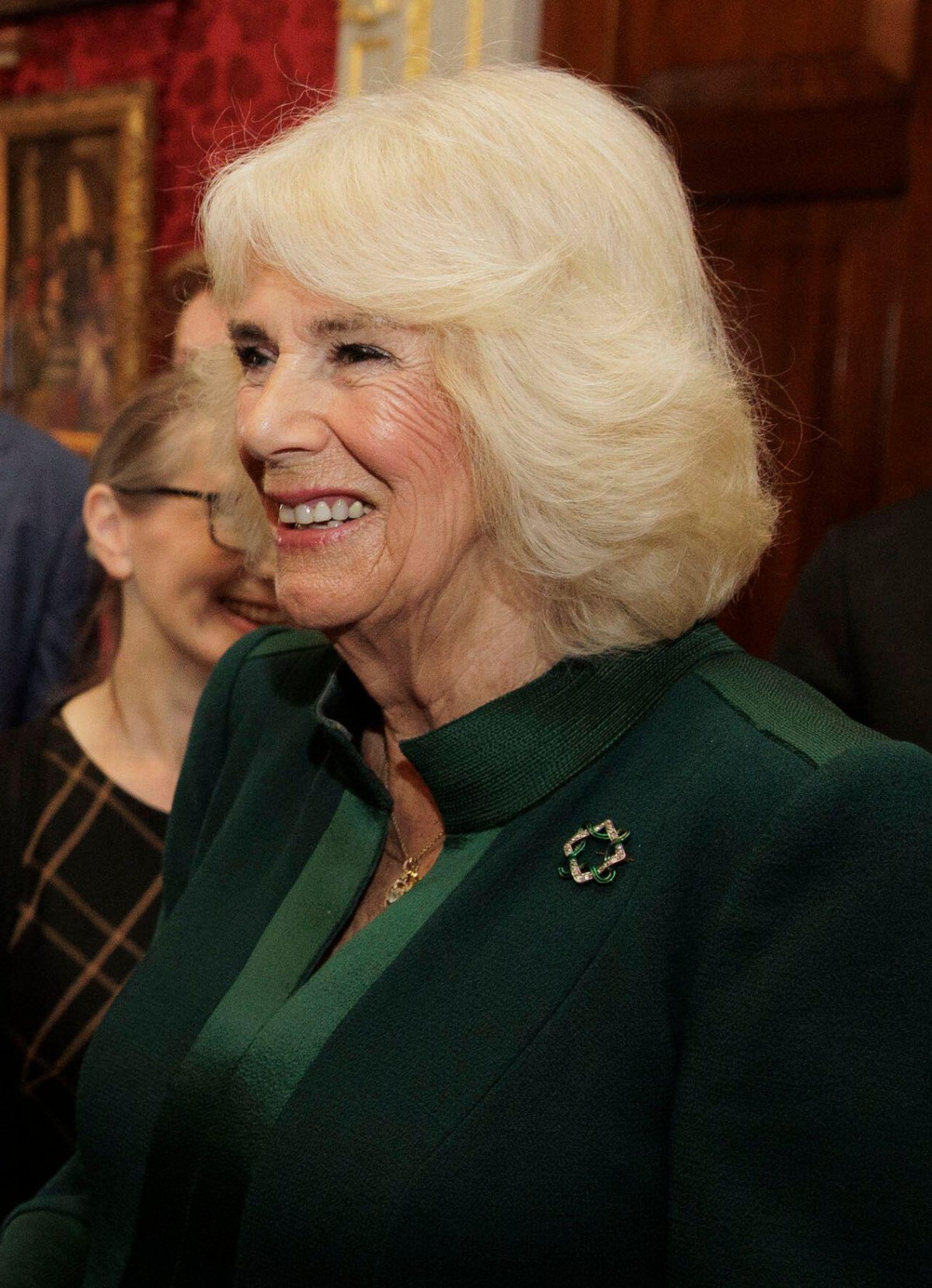 Queen Camilla of the United Kingdom attends a reception in the Queen's Reading Room to mark World Poetry Day at Hillsborough Castle in Belfast on March 21, 2024 (Liam McBurney/PA Images/Alamy)
