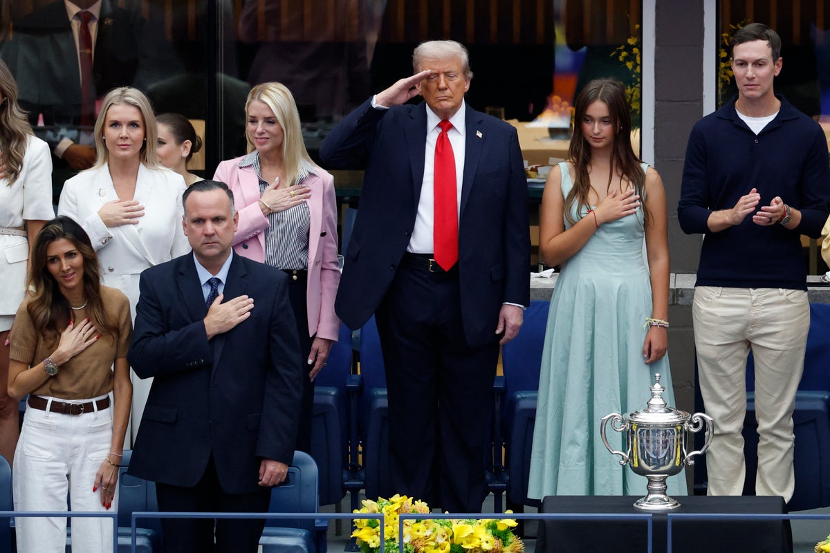 Donald Trump arrives at US Open men’s final to cheers and boos after broadcasters asked not to show reactions