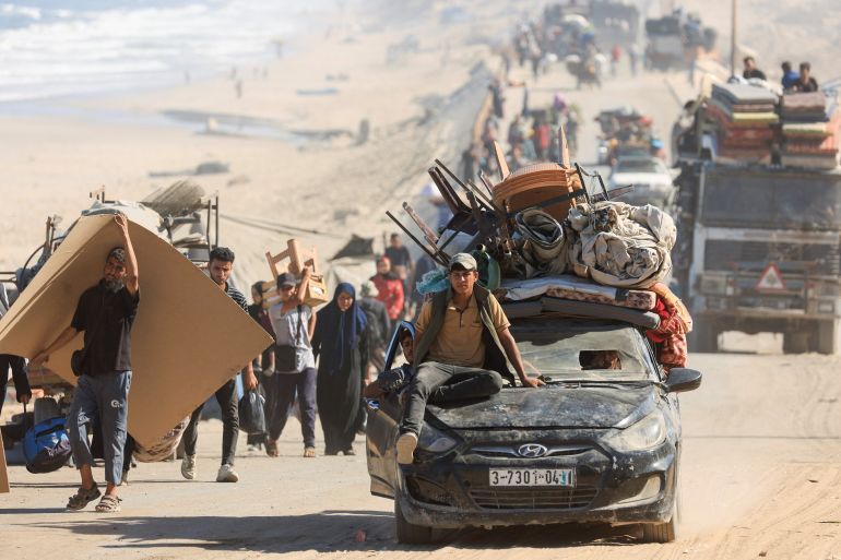 Displaced Palestinians, fleeing northern Gaza due to an Israeli military operation, move southwards after Israeli forces ordered residents of Gaza City to evacuate to the south, in the central Gaza Strip, September 20, 2025