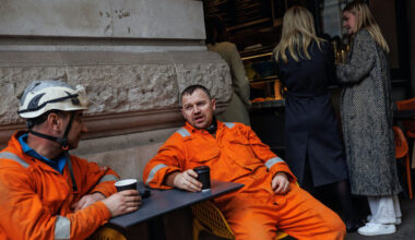 Construction workers take a break near Regent Street