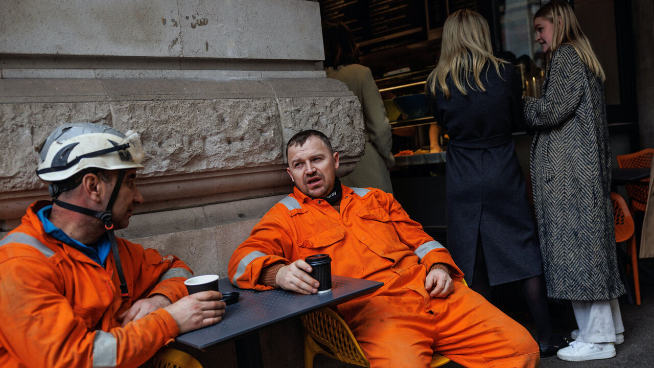 Construction workers take a break near Regent Street