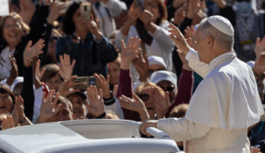 Pope Leo XIV greets pilgrims gathered in St. Peter's Square at the Vatican on September 27, 2025.