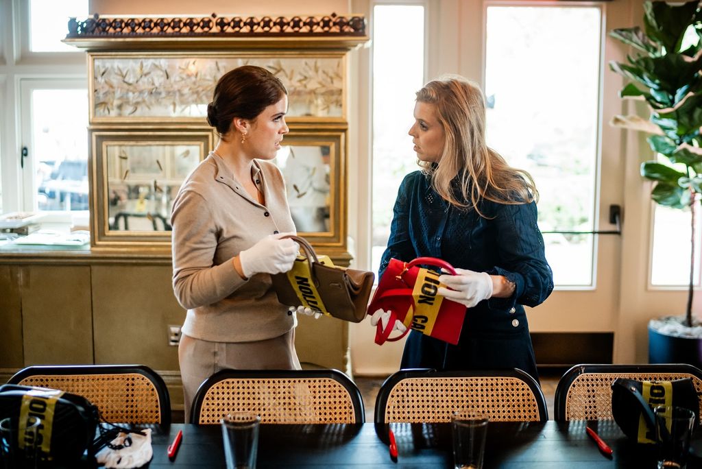 Princess Beatrice facing eugenie holding bags at event