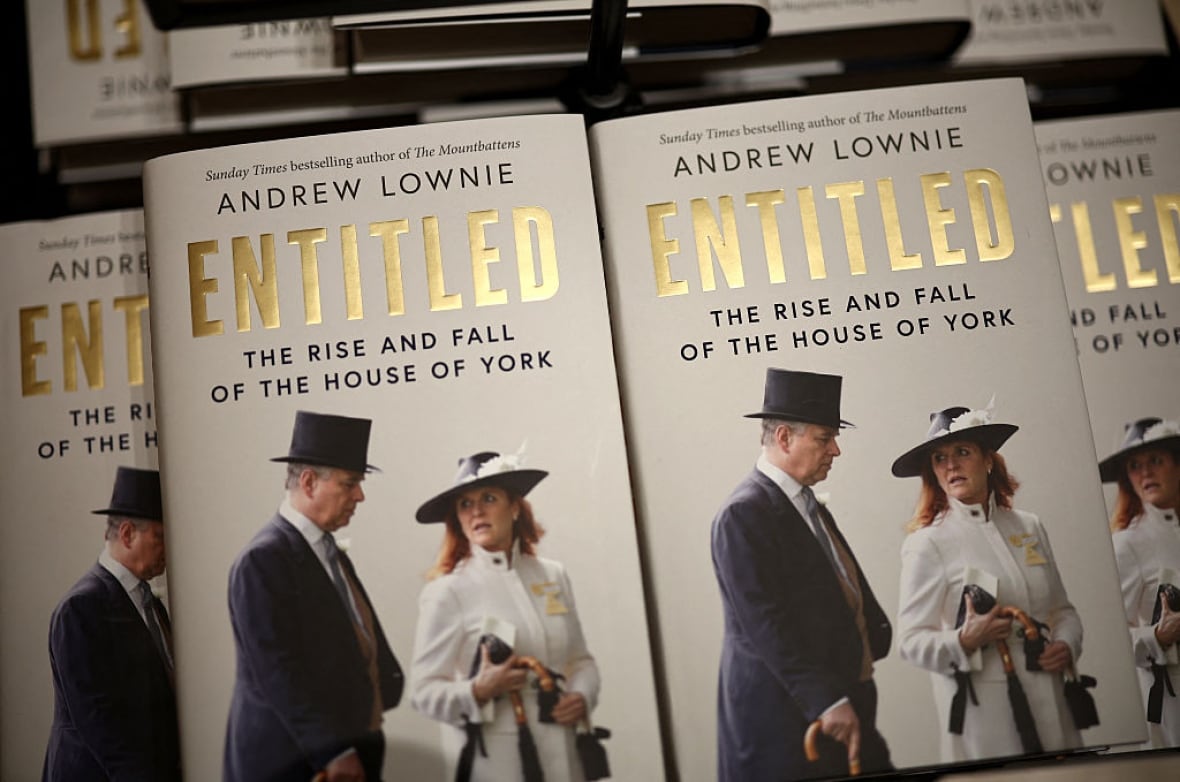 Two books with the title "Entitled" and two people on the front cover sit side by side.