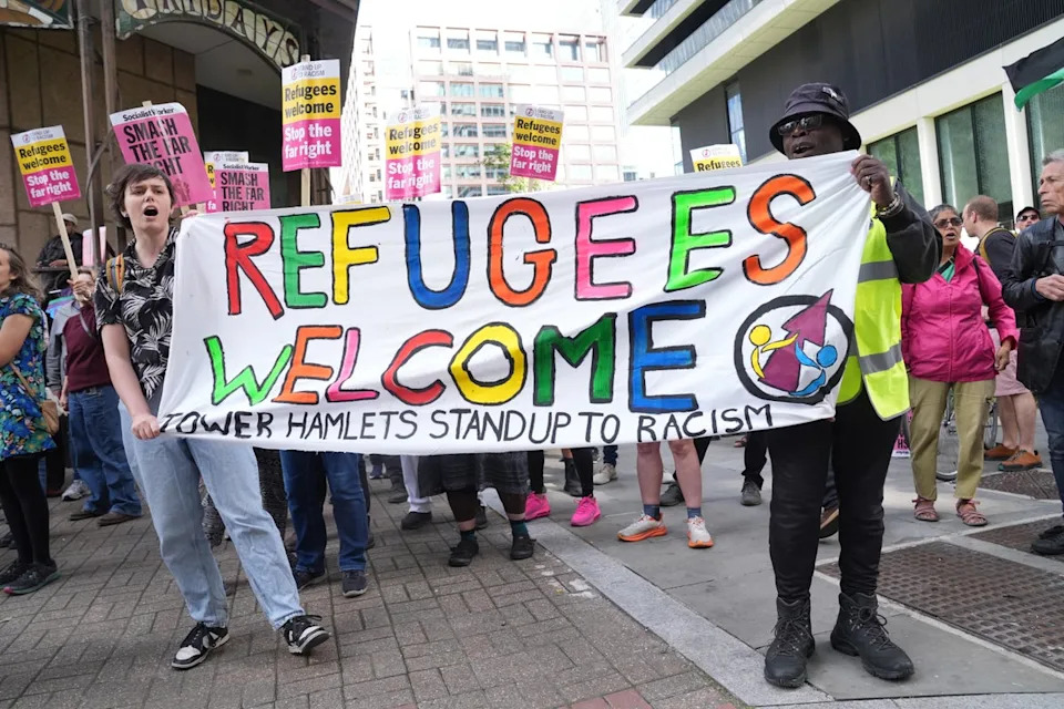 Counter-protesters rallied in Canary Wharf (Lucy North/PA Wire)