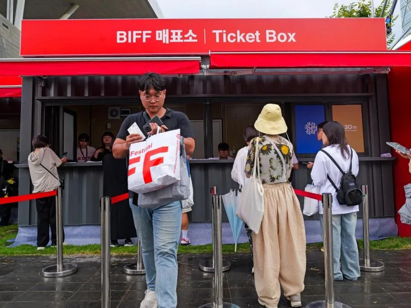 Fans line up to buy tickets for screenings at the Busan International Film Festival on Wednesday. Photo by Thomas Maresca/UPI