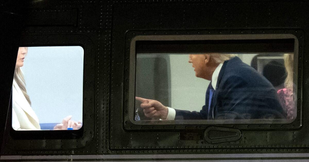 Donald Trump and Melania Caught in Tense Marine One Exchange | The first lady was seen shaking her head as the president jabbed a finger at her on the helicopter.