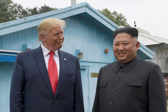 Donald Trump and Kim Jong-un tour the border village of Panmunjom in the Demilitarised Zone of South Korea in 2019.