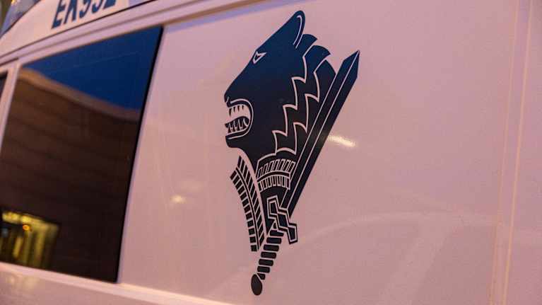 The picture shows a Border Guard logo on the side of the car.