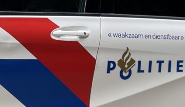 Anti-immigration protesters attack officers, set police car ablaze in The Hague
