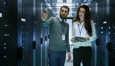 italy-data-center-man-woman-it-specialist-mainframe